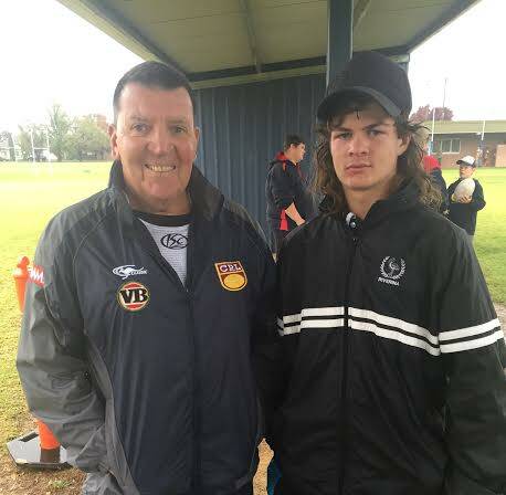 Lui Polimeni (on the right) standing next to Trent Barrett's father Bruce (left). Picture taken a fortnight ago.