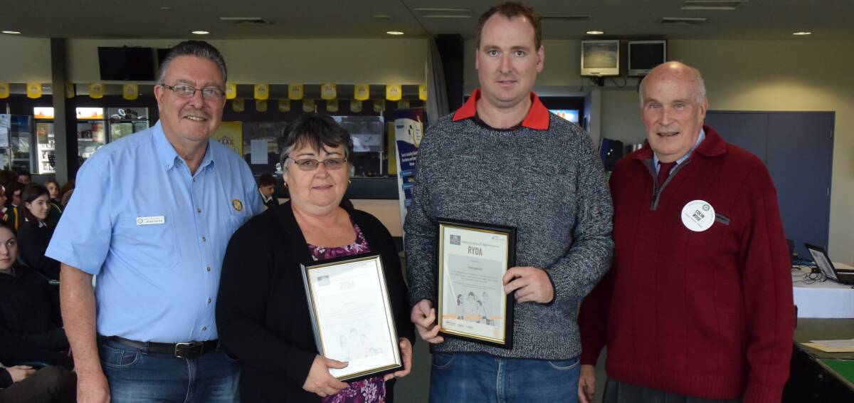 Appreciation: Co-ordinator of the RYDA program for the Rotary Club of Taree Laurie Easter and Rotarian Colin Rose present Sue and Todd Green with their certificates.