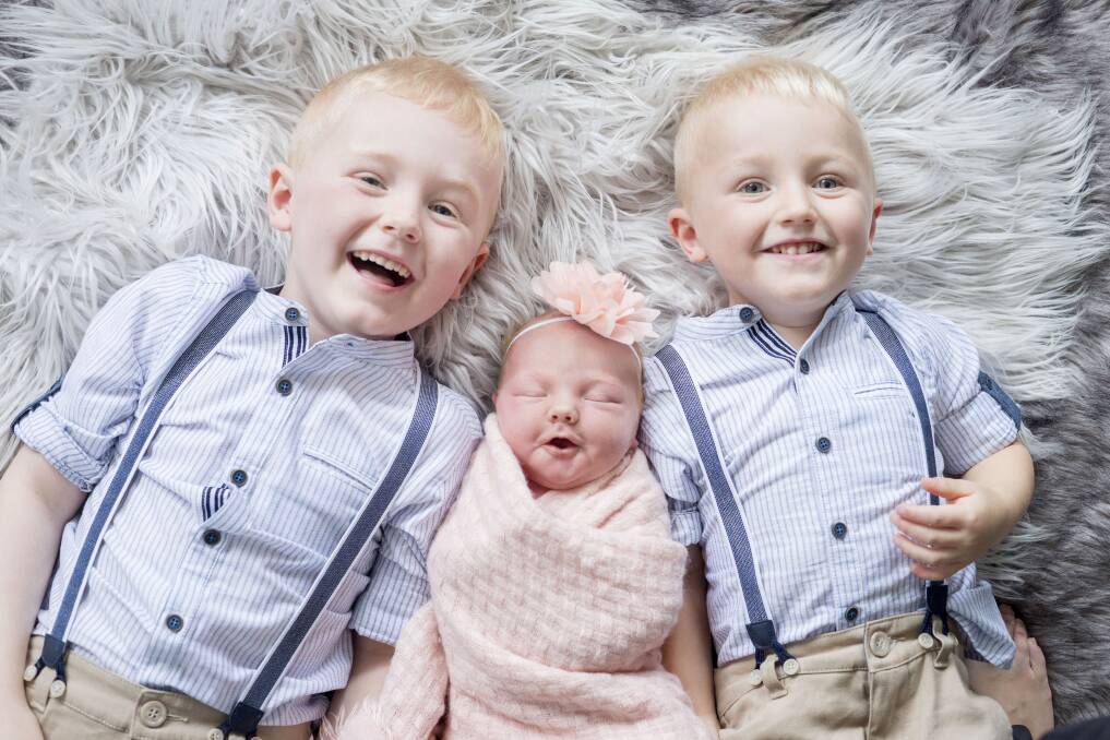 New arrival: Tillie Rose Jones with her big brothers Flynn and Harley. Photo: Imprint Imaging.