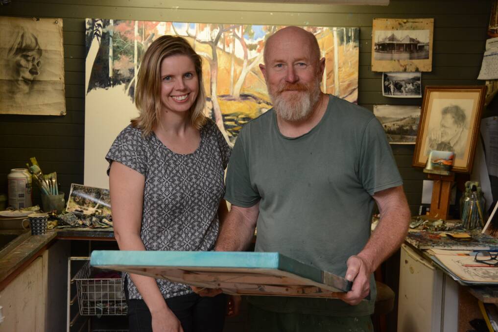 Talking art: Manning River Times journalist Lauren Green during her visit to artist Rod Spicer in his art studio as part of the Studio Spaces project.