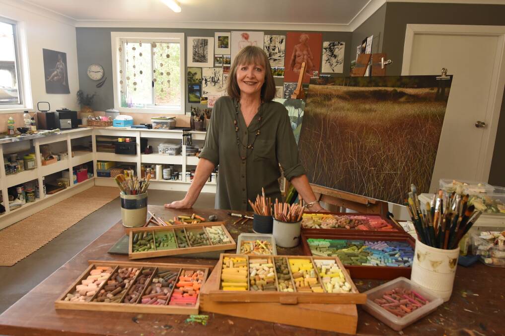 In her studio: One of Yvette Hugill's favourite things to paint is grasses. Photos: Scott Calvin.