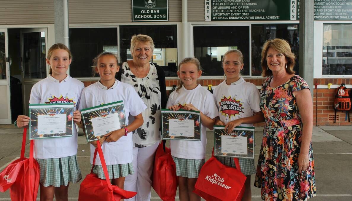 Award presentation: Jemma Holley, Amber Northam, Carole Isaacs from the Old Bar Manning Point Business and Community Association, Ruby Dunn, Pia Anker and Old Bar Public School principal Deborah Scanes.