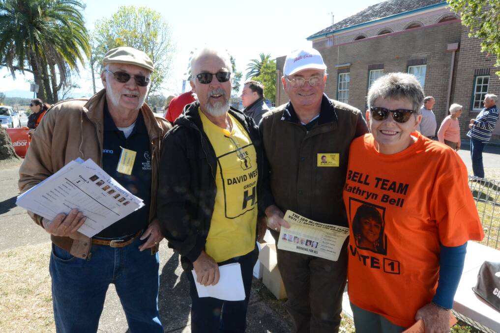 Handing out how-to-vote leaflets at Wingham Brush Public School were Ron Craig, Dan Patch, Chris Hutchison and Lyn Hadson.