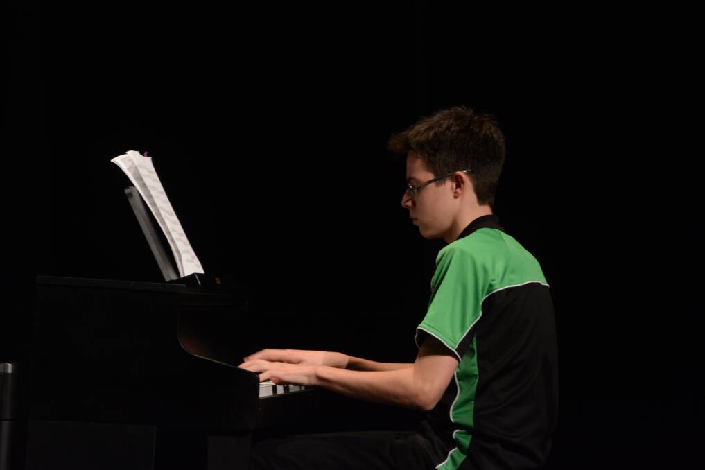 Mitchell Brown on the electric piano during the first day of competition.