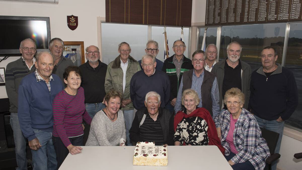 Celebrating: Manuel Zaunders (front row, centre) and members of the Manning River Aero Club celebrate his 90th birthday. Photo by Ashley Cleaver/Cleavers Images.