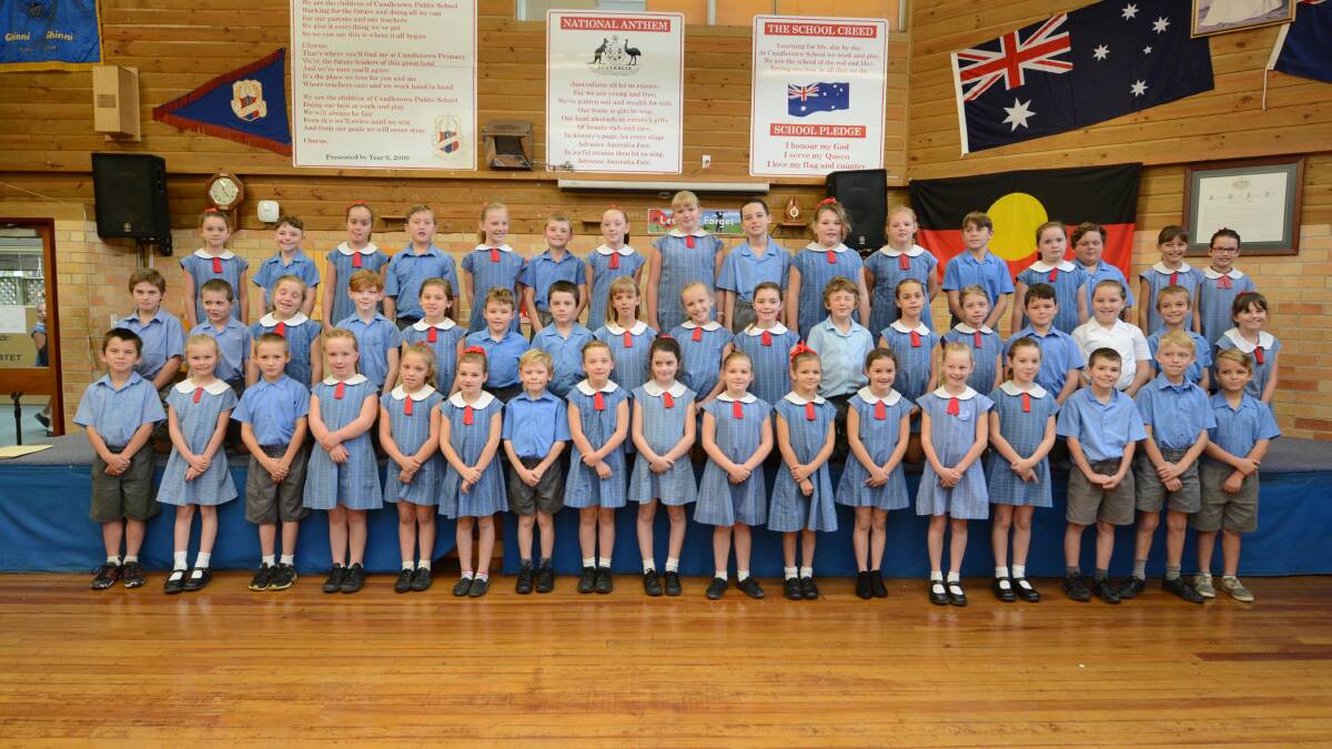 The infants choir, led by Karen Forrester, includes students from years one and two, and sang I am the Earth and Sausages and Custard.