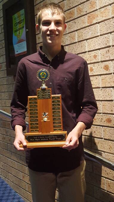 Keegan Gibson with the Roma Liggins Perpetual Scholarship trophy, which he won at this year's Taree and District Eisteddfod.