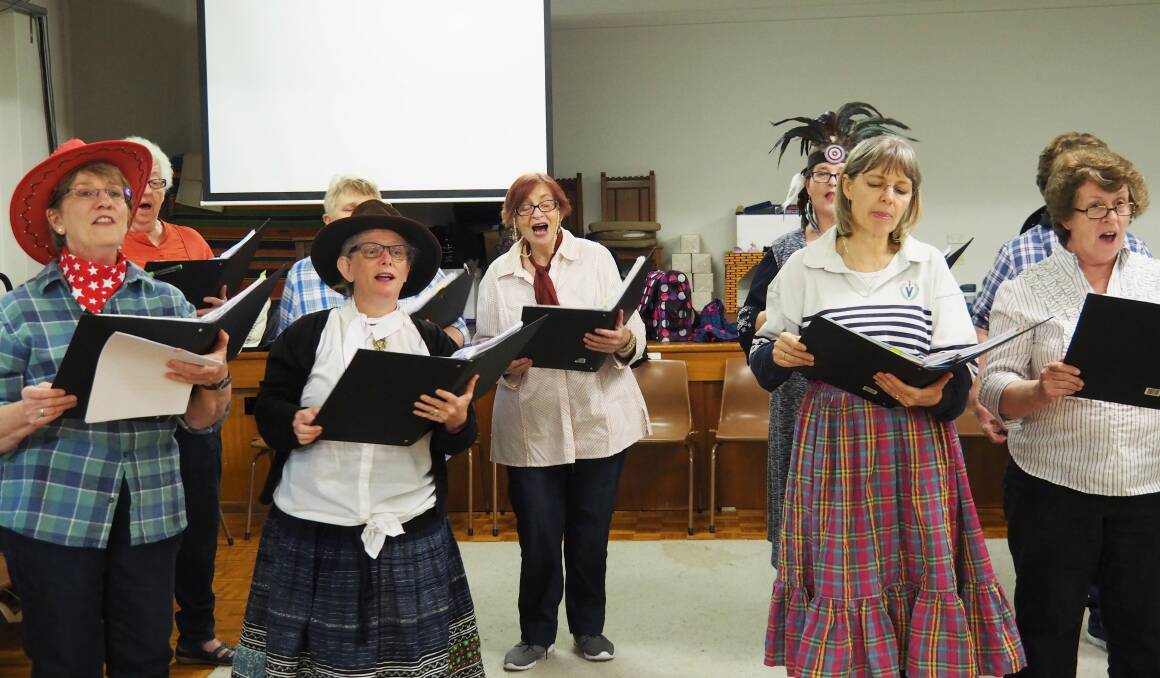 Women of the choir: Kerry White, Margaret Moon, Merrill Phillips, Kellie Trezise, Geraldine Mullin, Lia Wrigley and Heather Sydee singing “Out of My Dreams”.