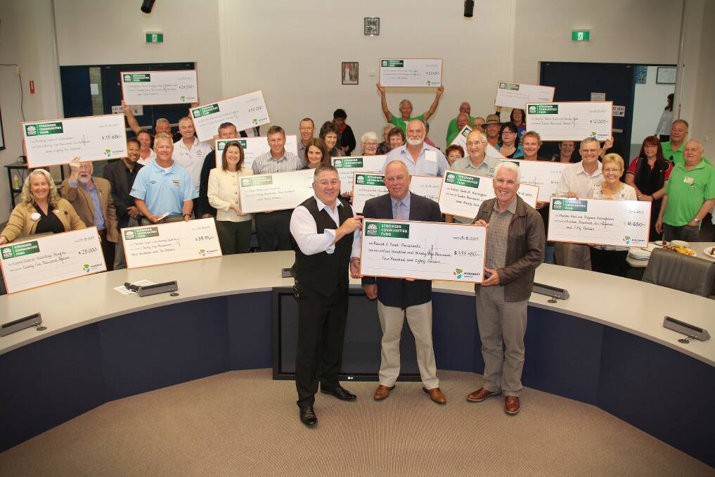 Funding: MidCoast Council’s director Community Spaces and Services Paul De Szell, administrator John Turner and general manager Glenn Handford with recipients of round two funding from the Stronger Communities program.