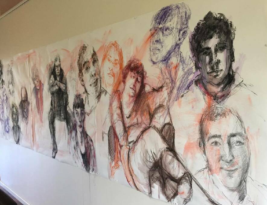 The wall at Manning Regional Art Gallery where Jo Ernst is creating portraits of people who come in and sit for her.