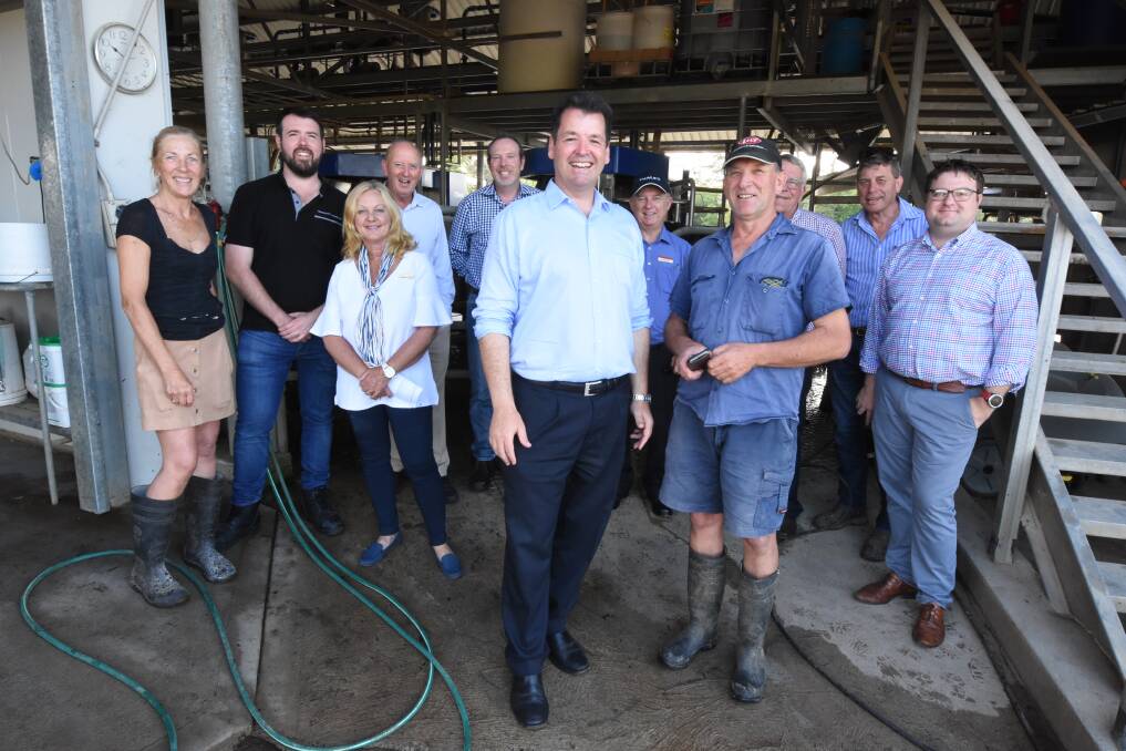 On site: Michael Sharpe from the Advanced Manufacturing Growth Centre with farmer Adrian Drury and wife Stella (at left) on the Drury farm with industry representatives.
