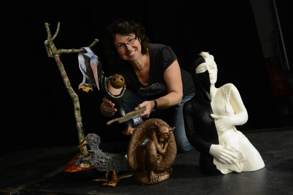 Three dimensional art: Christine Long with some of the entries from the 3-D Art section, which caters for sculpture, pottery and mobiles. 