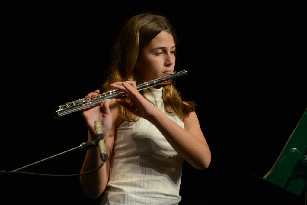 Madeleine Tidbury plays the flute.