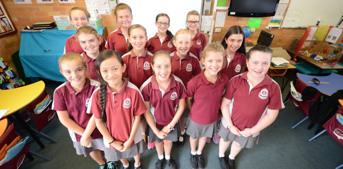 Ready to sing: The Taree West Public School choir is performing two songs at this Sunday's Carols in the Park. Pictured are Maddy Prowse, Rahni Seckold, Jessica Tregillgas, Breanna Colvin, Sophie Hawkins, Tyla Humphrey, Kate Fletcher, Sophie Whittaker, Jessica Osmond-Dreyer, Annie Chen, Chyna Johnson, Jessica McLeod and Makenzie Ford.