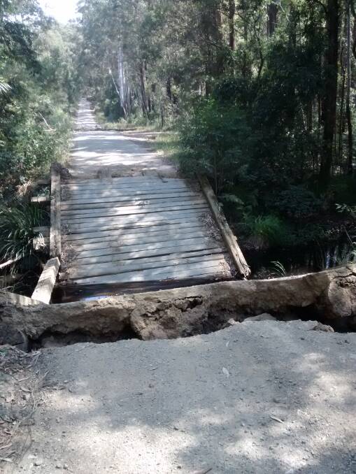 The damaged bridge in Coopernook State Forest. Photo: Ian Hodson.
