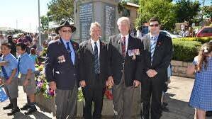 Kempsey-Macleay RSL Sub-branch president Terry Hunt with three guest speakers from the 11am Anzac Day service in Kempsey - MickEller, Jim Love and Tas Tasdemir in 2015.