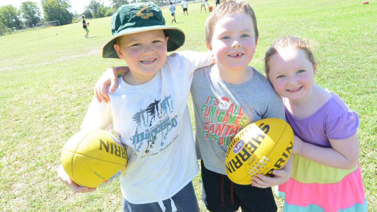 Young Mustangs Jacon Brown-Stokes with Joseph and Alex Wright at the Come 'n' try day held at Wrigley Park. The Mustangs will field two teams in this year's North Coast junior competition.