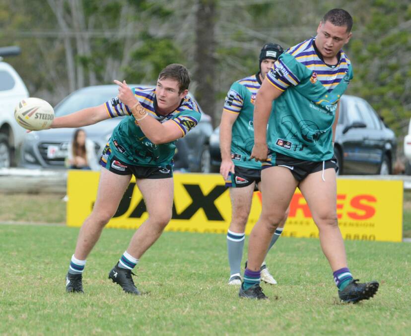 Taree City hooker Toby de Stefano whips out a pass from dummy half during the clash against Wingham. He had a fine game in Taree's 28-18 win.