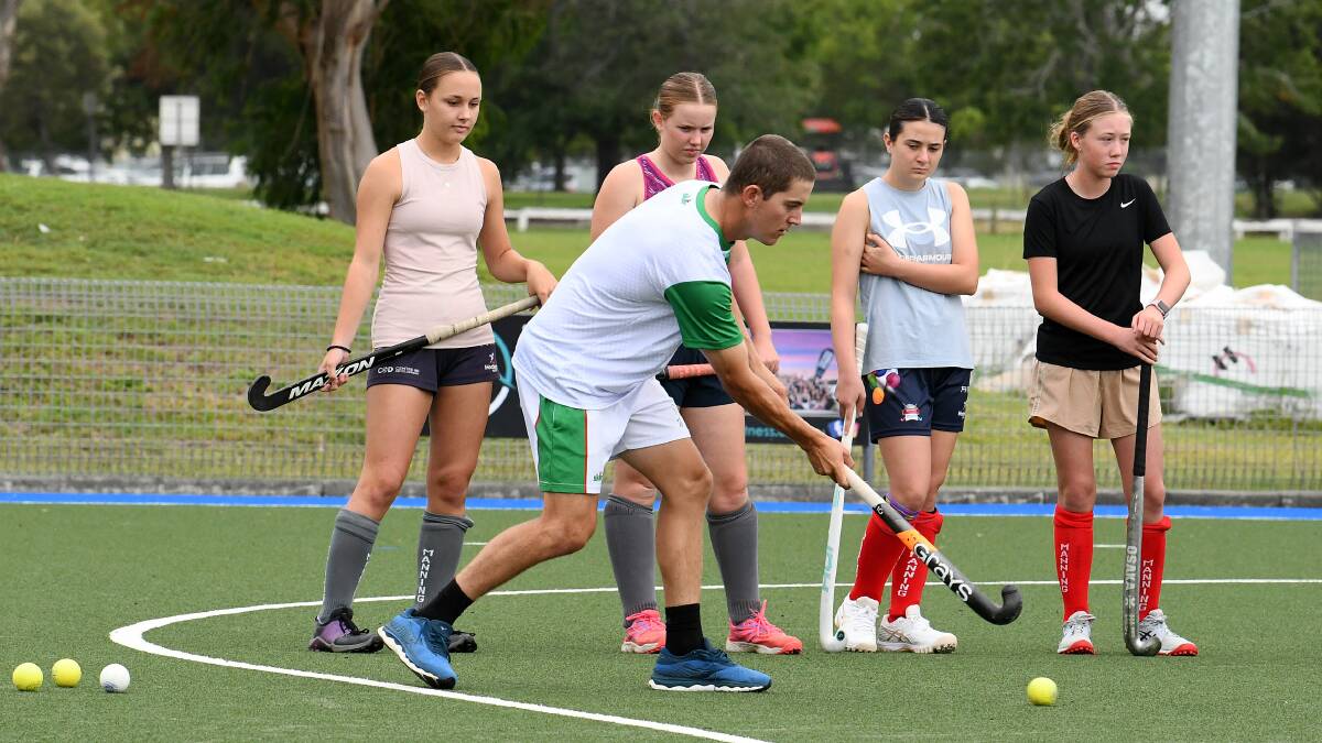NSW Pride representative Sam Mudford conducting a coaching clinic in Taree earlier this year. He's signed to play with Chatham this season.