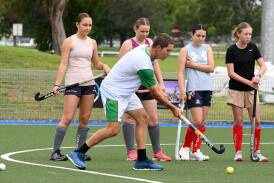 NSW Pride representative Sam Mudford conducting a coaching clinic in Taree earlier this year. He's signed to play with Chatham this season.