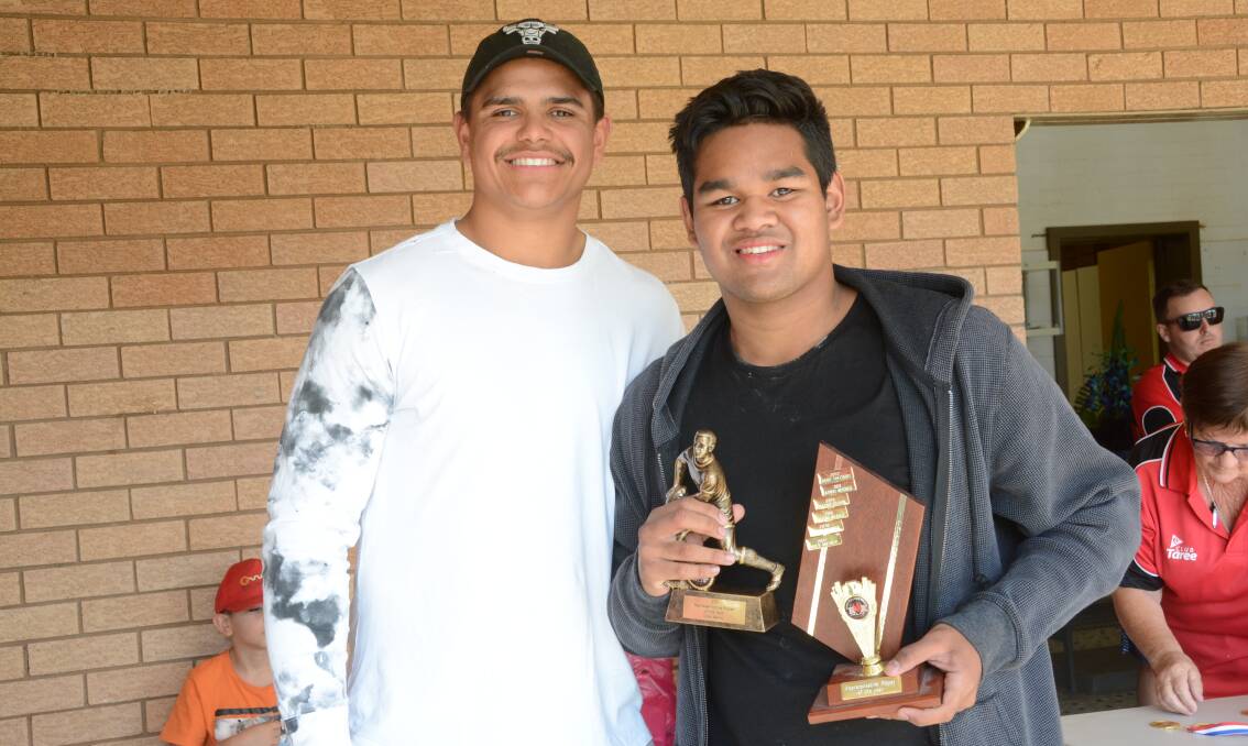 Latrell Mitchell was the special guest at his junior league club Red Rovers' presentation held at Taree Recreation Centre last weekend. He is pictured with the club's international player of the year, Drey Mercy.