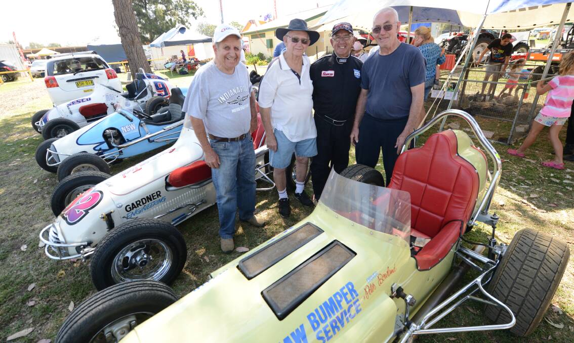 Bill Shevill (second from the right) with Gordon Benny, Charlie Villa and Phil Powell at a display of vintage speedway cars held during the 2014 Taree Show.