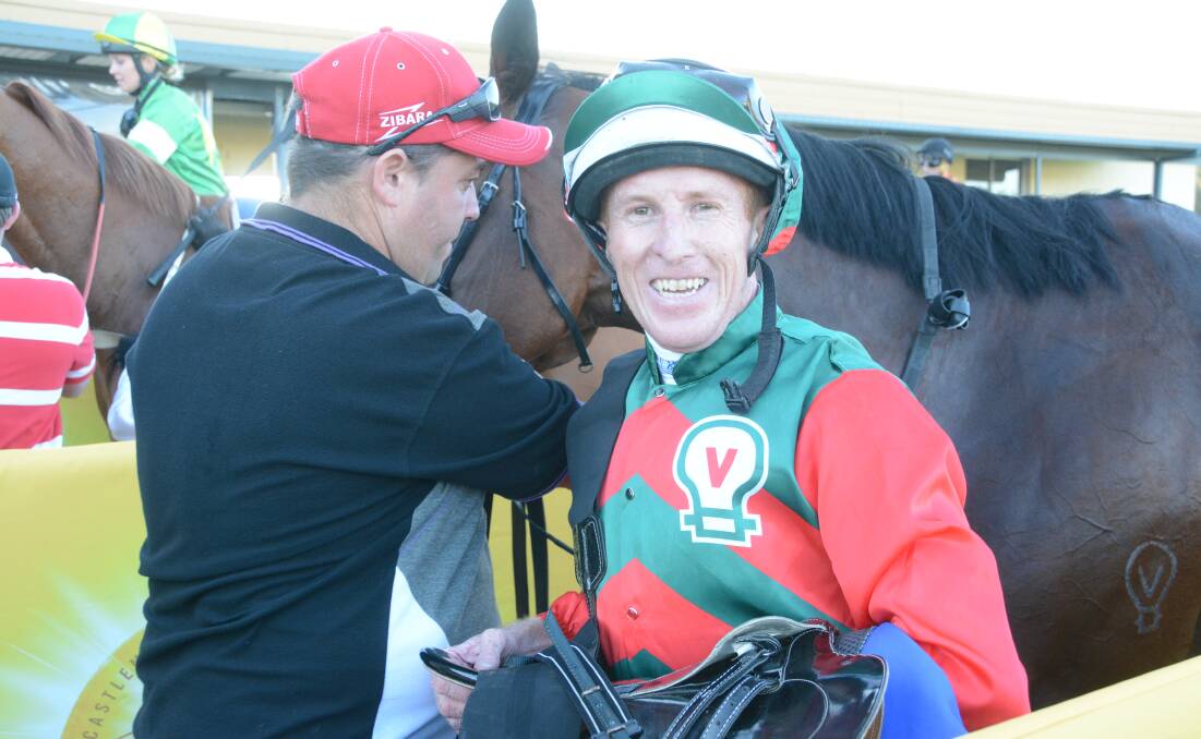 Jockey Max Bennett was all smiles after his win on In A Wink in the Gloucester Cup raced at Tarees' Bushland Drive track this week.