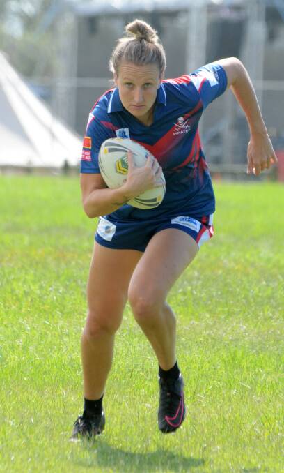 On the run: Holli Wheeler will debut for the Newcastle Knights this weekend in a women's nines rugby league match against the Cronulla Sharks.