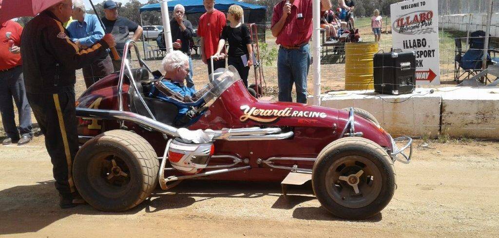 Bill Shevill makes some last minute adjustments before heading off for a drive during the vintage speedway meeting named in his honour at Illobo Showground.