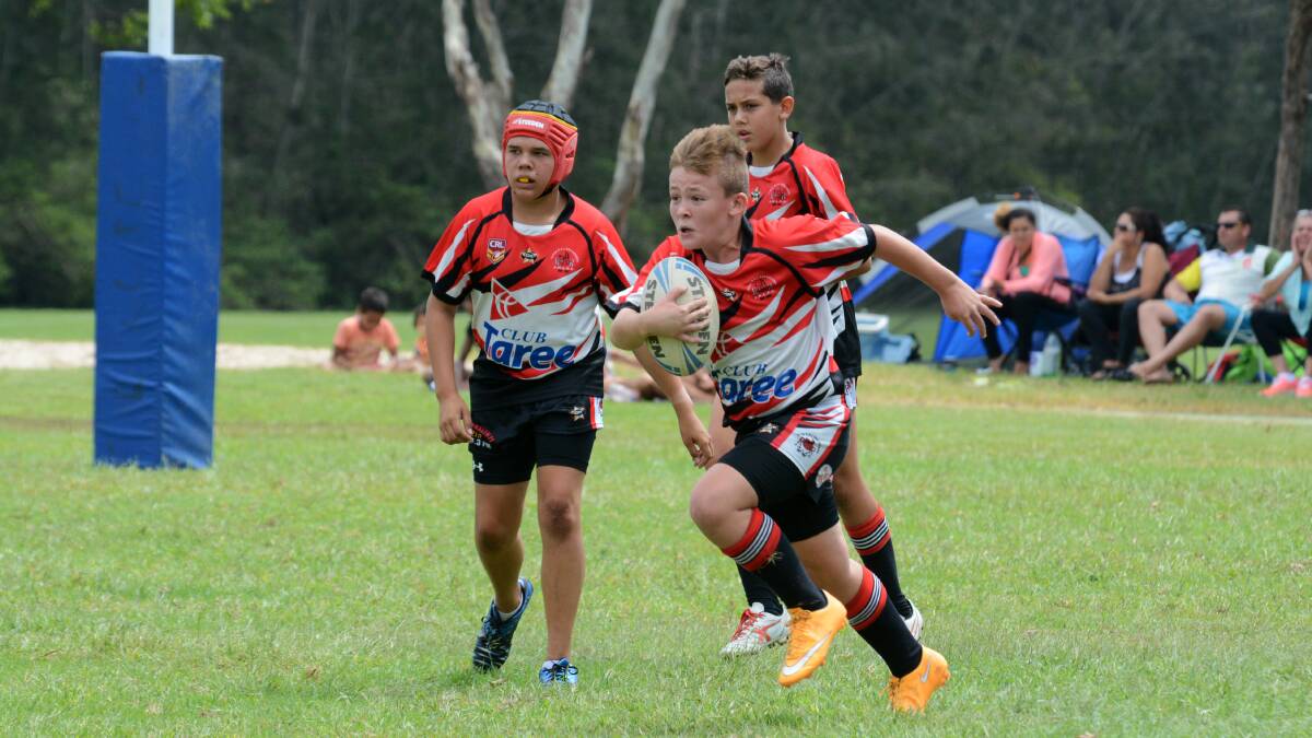 Cooper Seckhold on the charge for Red Rovers in a Group Three Junior Rugby League game played in 2015.