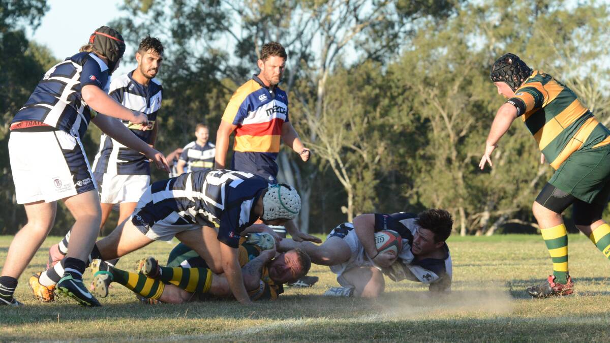 Manning Ratz and Forster-Tuncurry players scramble for possession in a Lower North Coast Rugby Union fixture last season. The 2017 premiership starts on Saturday.