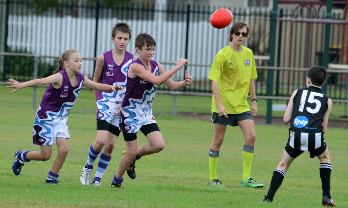 Jacobi Shaw in action for Manning Mustangs in a North Coast Junior AFL match against    Port Macquarie at the Johnny Martin Oval.