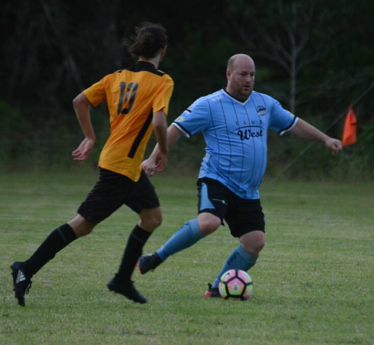 Taree veteran Ben Sedlen confronts the Tuncurry-Forster defence during the premier league clash at Tuncurry. The Wildcats head to Kempsey tomorrow to meet Macleay Valley.