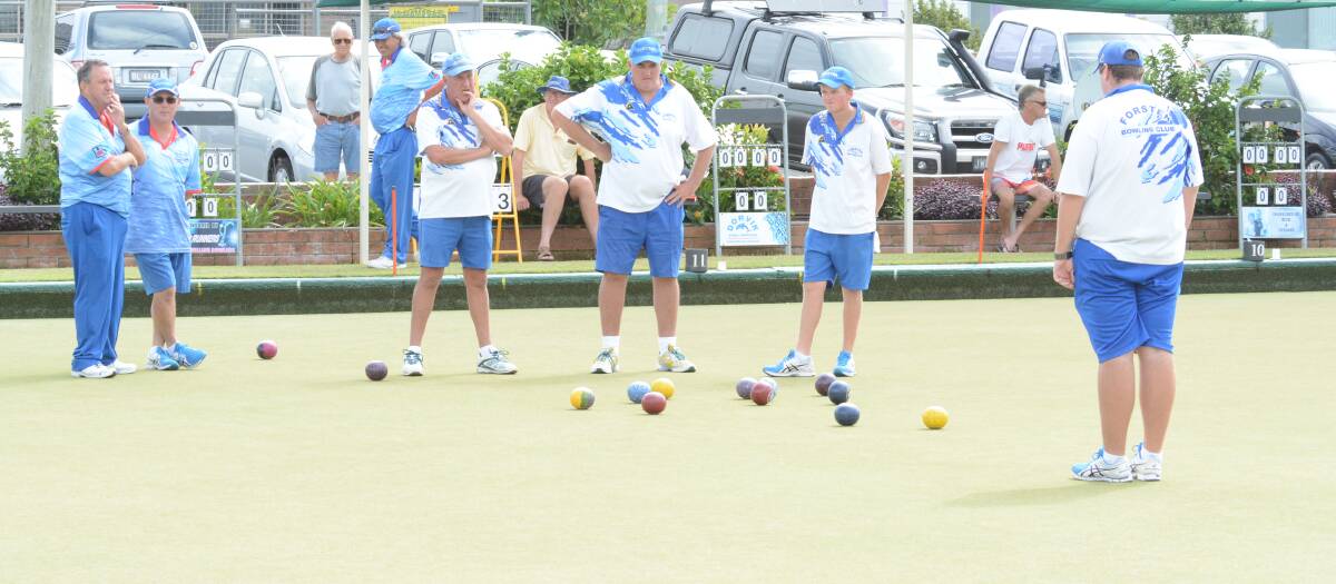 Players sum up the situation during the Zone 11 fours final played at Forster Bowling Club.
