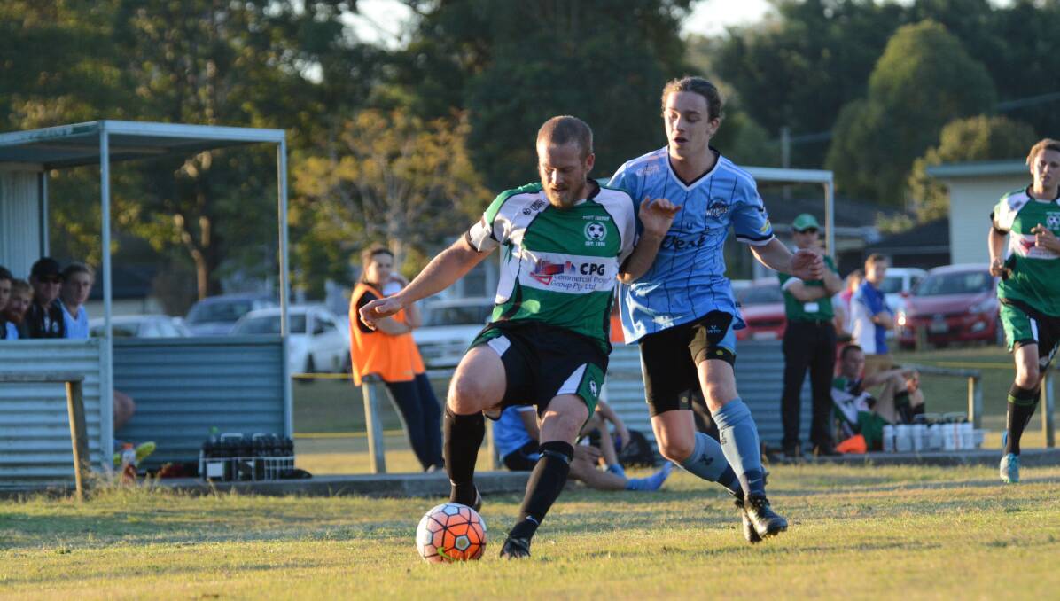 Taree's Callum Griffis moves to stop an opponent during a Football Mid North Coast Premier League match played this year at Omaru Park.