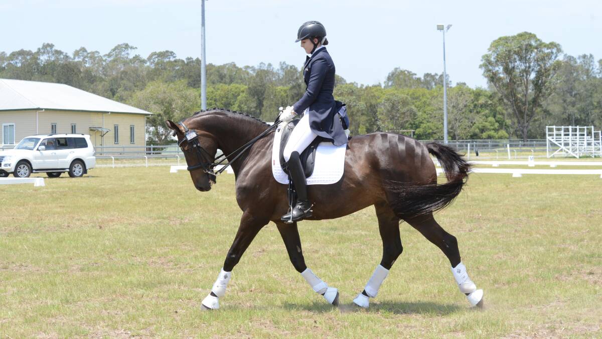 Sienna Hawkins from Taree on Saintly competing in an event in the dressage championships held at Taree Showground.