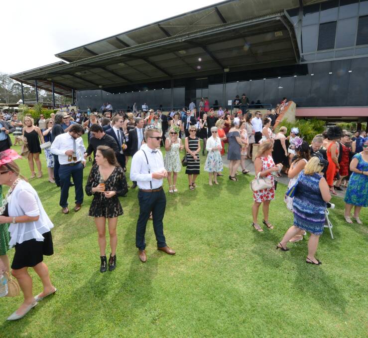 A section of the crowd at the Bushland Drive track early on Melbourne Cup day. Nearly 2000 patrons attended the meeting.