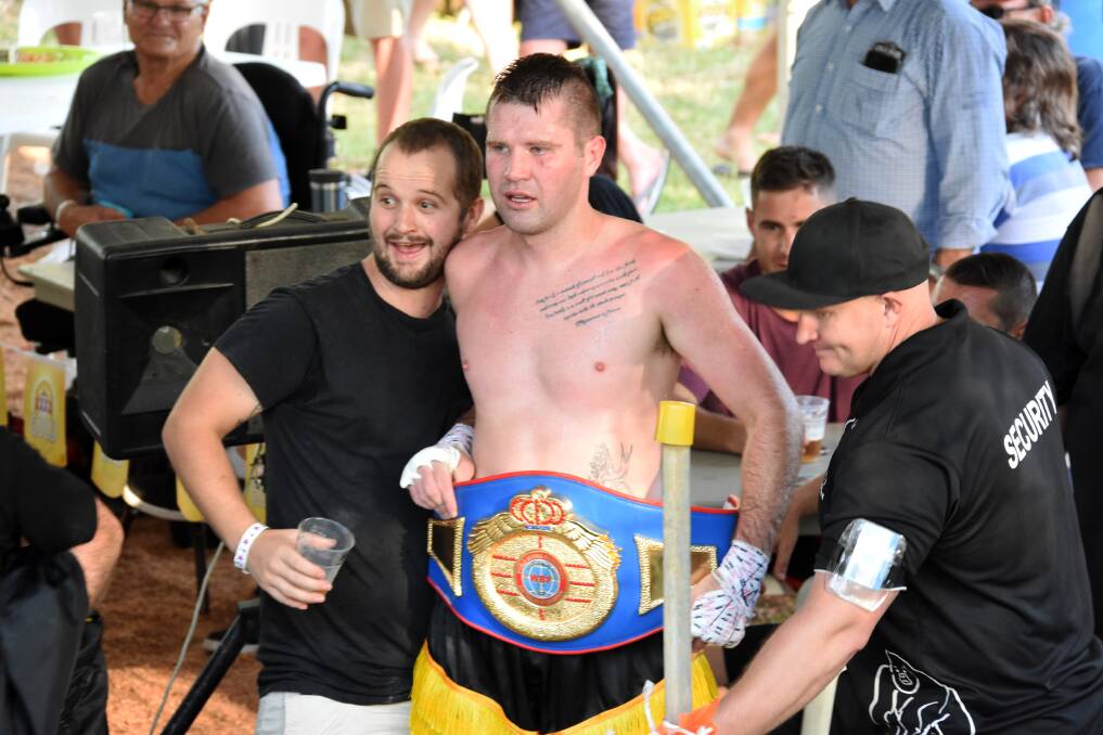 Adam Fiotzsimmons with his belt after his win in the Australasian light heavyweight title bout.