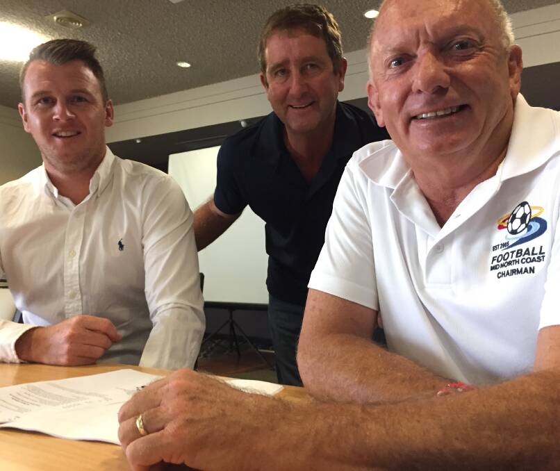 Football Mid North Coast chairman Mike Parsons (right) with Northern NSW  community football manager Peter Haynes and FMNC board member Mark Woodward.