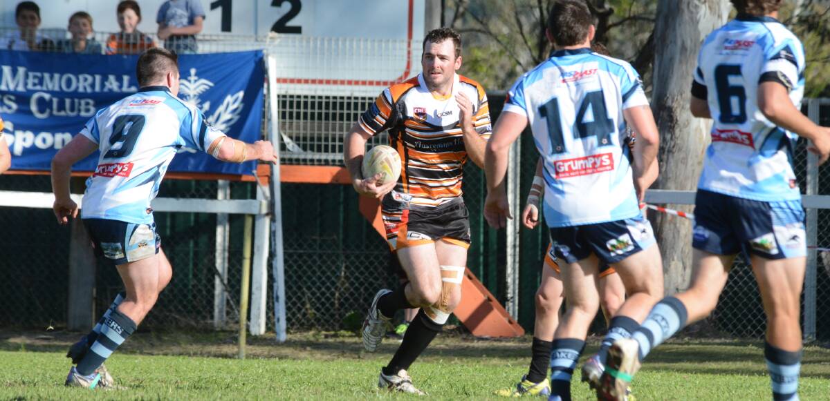 Wingham forward Michael Richards takes the ball to the Port City defence. His dismissal late in the first half proved to be the turning point of the preliminary semi-final, eventually won 36-22 by Port.