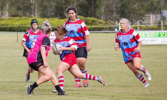 Emma Ralph on the charge for Old Bar at the Crescent Head Sevens. She was voted the players' player at the tournament.