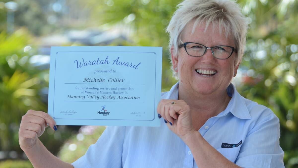 Manning Hockey stalwart Michelle Collier with her Waratah Award. She's worked for hockey in this area for more than 30 years.