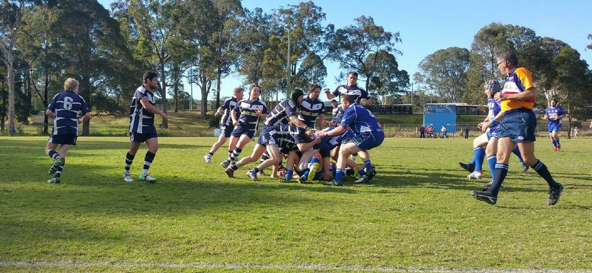 Manning Ratz and Wallamba players battle for possession during the final played at Nabiac. Wallamba won 39-29 to move through to next Saturday's grand final against Forster-Tuncurry.