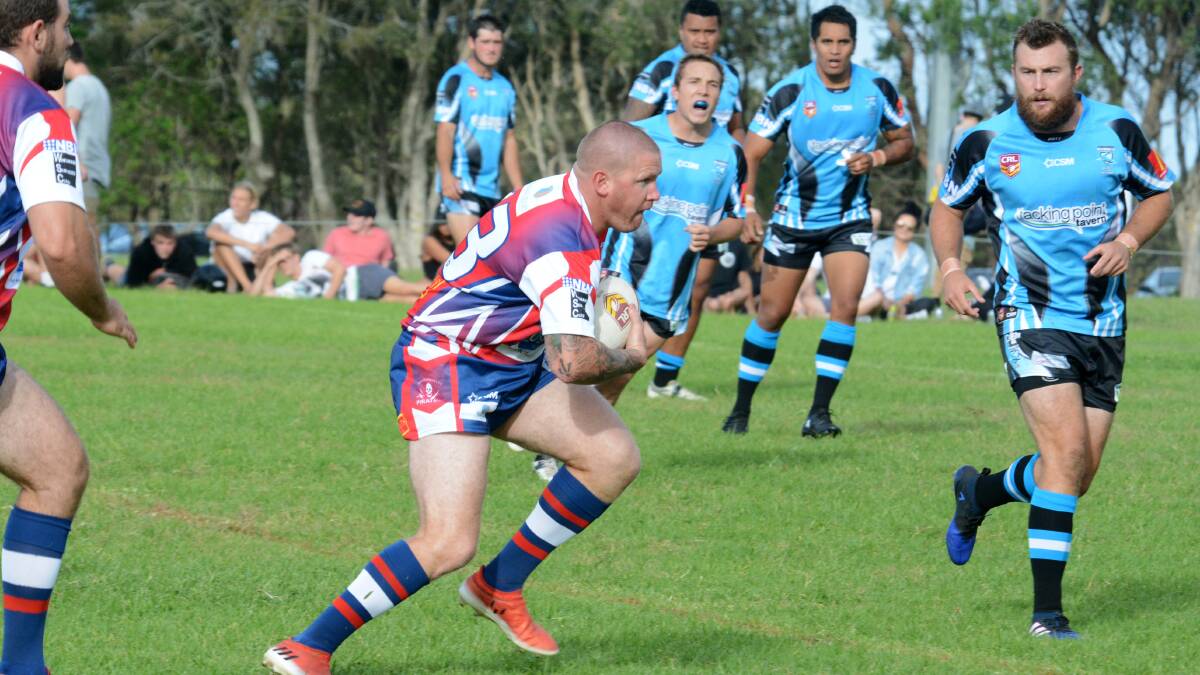 Old Bar captain-coach Danny Russell props as he confronts the Port Macquarie defence in the Group Three Rugby League clash at Old Bar this season. The Pirates meet Forster-Tuncurry at Tuncurry on Sunday.