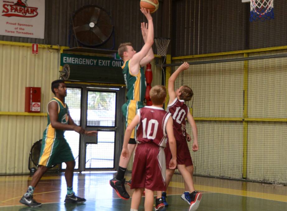 Jack Scott goes up to attempt a basket during the recent representative clash against Gloucester.
