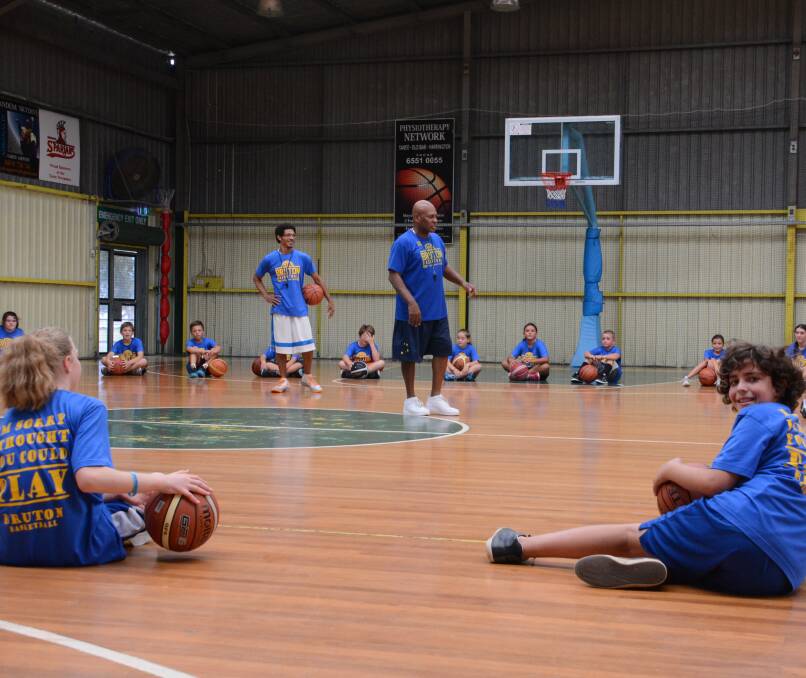 Cal Bruton conducting a basketball clinic in Taree last January. He'll be back for a two day camp next Tuesday and Wednesday at Saxby's Stadium.