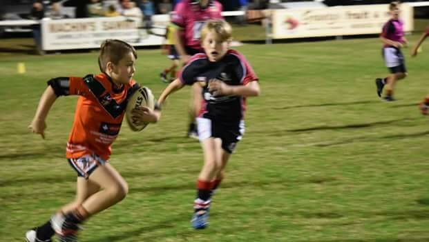 Scott Thrift makes a break for Wingham in a junior league clash played at the Wingham Sporting Complex on Friday night.