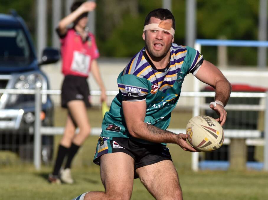 Taree City hooker Mick Henry is perfectly positioned as he sends out a pass during the Group Three Rugby League minor semi-final. Henry was strong in Taree's 32-28 win. Photo Ivan Sajko/Port Macquarie News