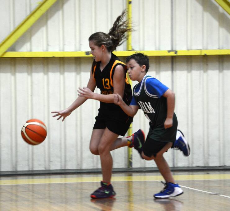Mariah Radburn makes a beeline up-court during a match in Taree Basketball's popular schools competition. Planning for term four is underway.