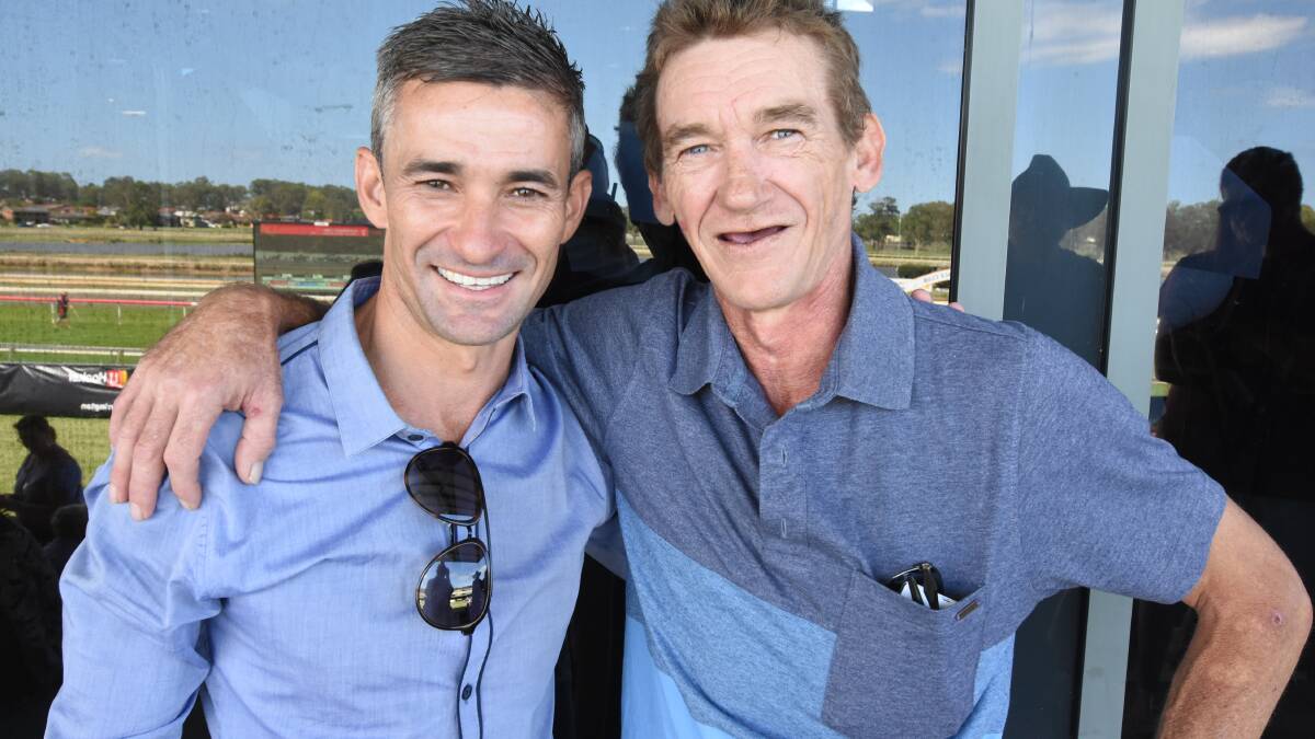 Happy hoops: Corey Brown with former leading Mid North Coast jockey Shane Arnold at the Harrington Cup meeting. Arnold, who has retired from the saddle, was the association's top rider when Brown started his apprenticeship at Taree more than 25 years ago.